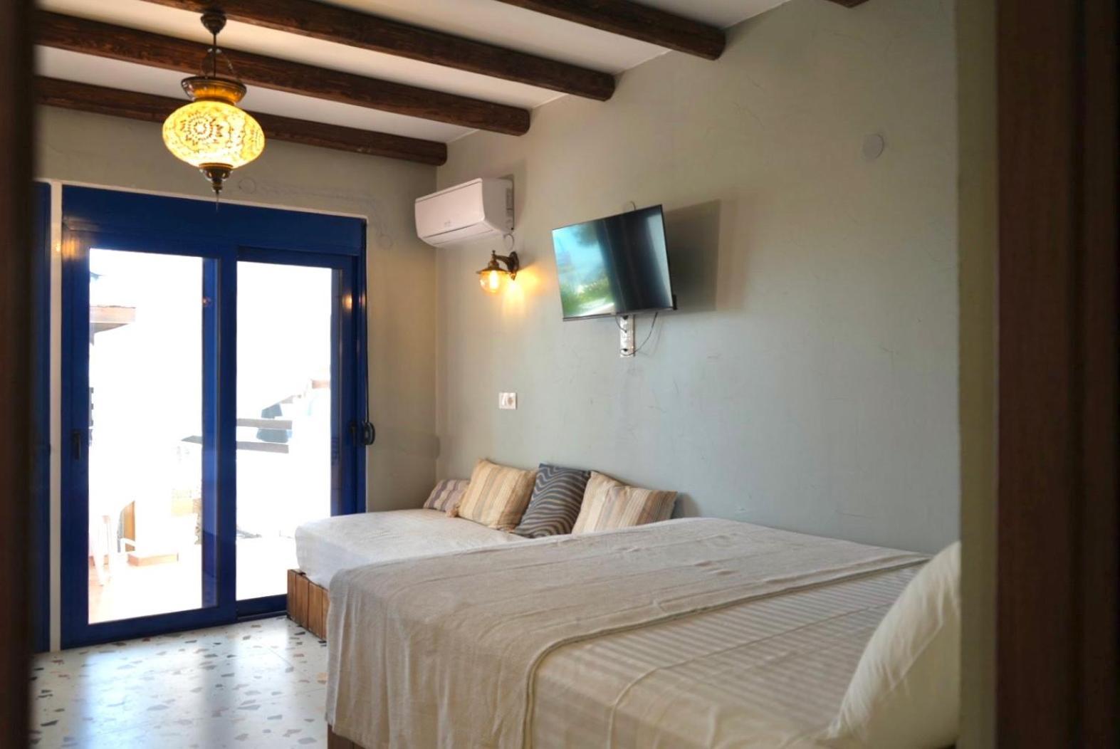 George Suites Stegna Архангелос Екстериор снимка
