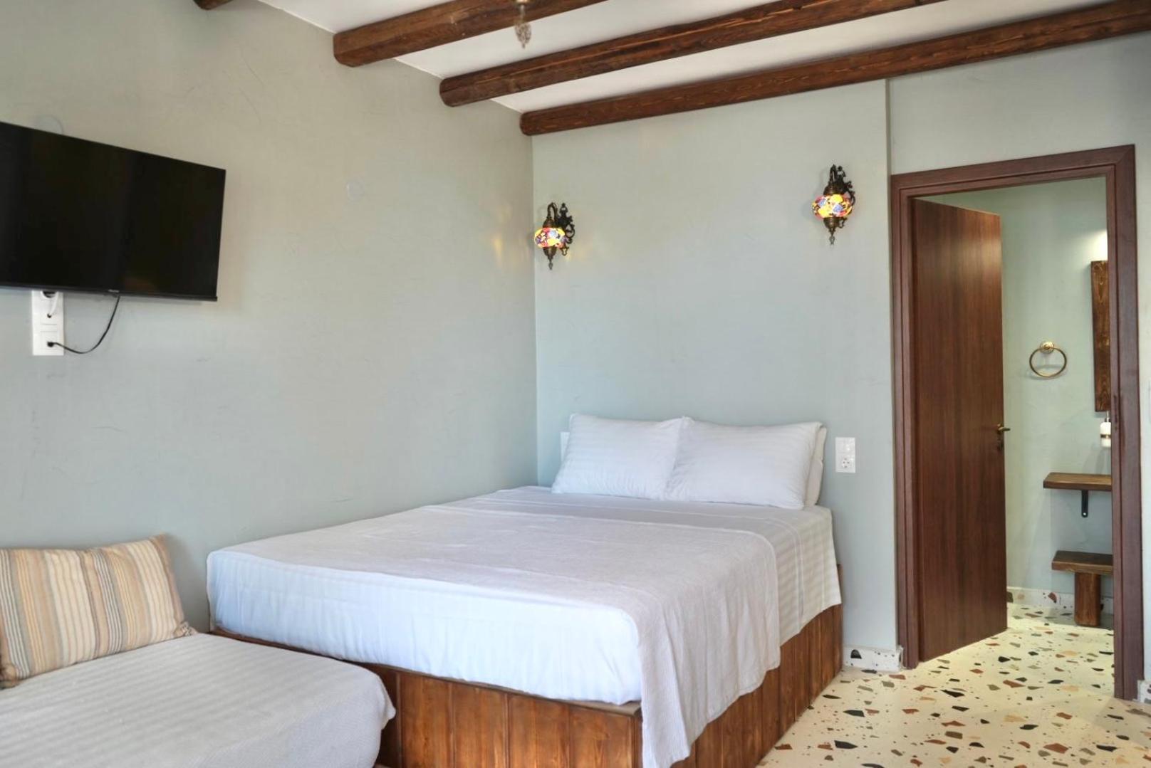 George Suites Stegna Архангелос Екстериор снимка